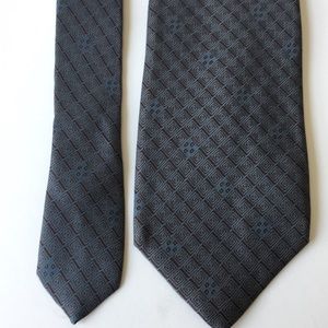 Schreter grey/blue tie “the search for Alexander”